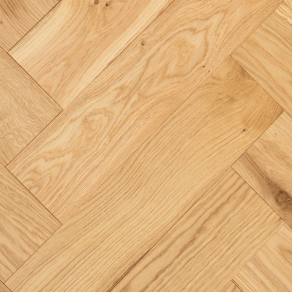 Aerial view of Castlehoward Herringbone Engineered Oak flooring showcasing its natural brushed UV oiled finish and intricate herringbone pattern.