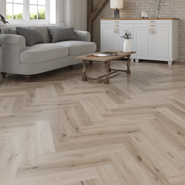 Wide room view of Devon LVT Herringbone White Wash Grey Oak flooring with herringbone design and micro-beveled edges