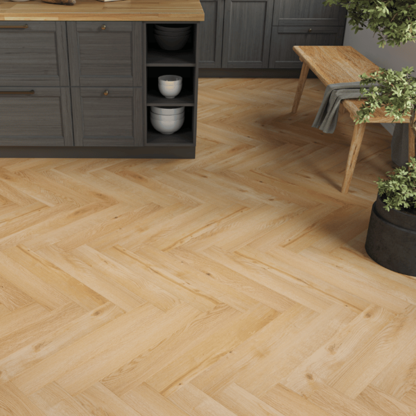 Close-up view of Dorset Herringbone Laminate Light Natural Oak plank with realistic wood grain and bevelled edges
