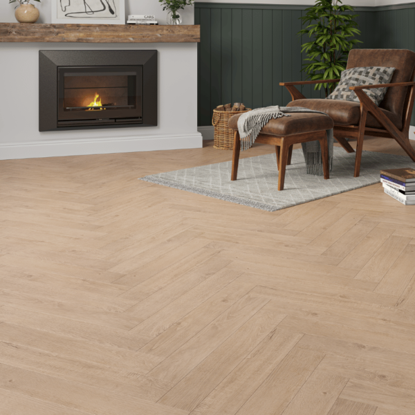 Wide room view of Dorset Herringbone Laminate Light Oak flooring with classic herringbone design and bevelled edges