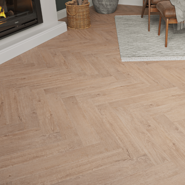 Close-up view of Dorset Herringbone Laminate Light Oak plank with realistic wood grain and bevelled edges