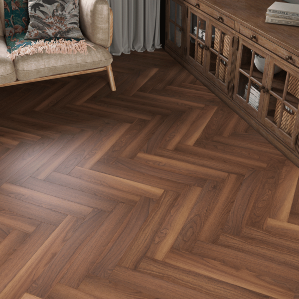 Close-up view of Dorset Herringbone Laminate Walnut & Caramel Oak plank with realistic wood grain texture and bevelled edges