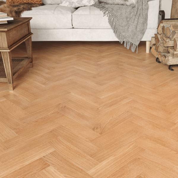 Goodwood herringbone oak flooring with natural UV lacquer finish, rustic-grade oak planks with bevelled edges