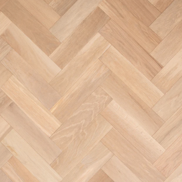 Aerial view of Petworth Engineered Oak herringbone flooring in a smooth, unfinished surface, ready for custom finishing.