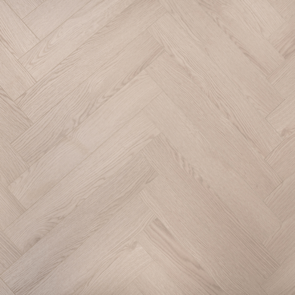 Light Grey Oak herringbone laminate flooring with furniture, highlighting its modern tones and realistic wood finish