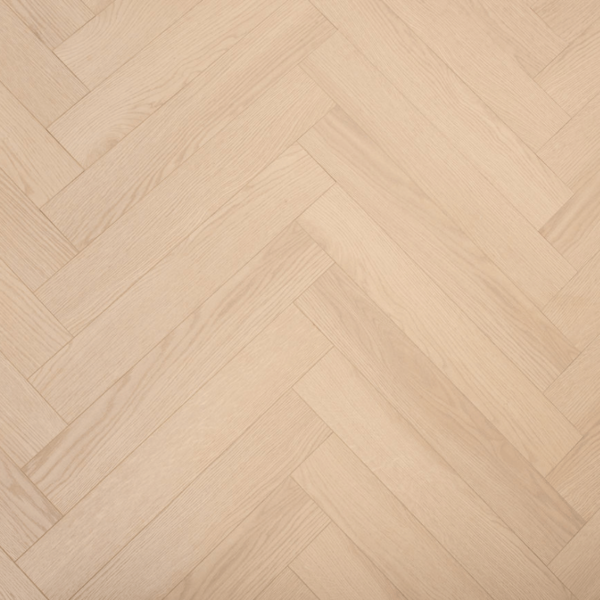 Aerial close-up of Prestige Herringbone 12mm Natural Oak laminate flooring plank, highlighting its texture and V-groove edges