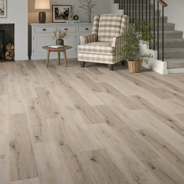 Wide room view of Surrey LVT White Wash Grey Oak flooring with straight plank design and micro-beveled edges