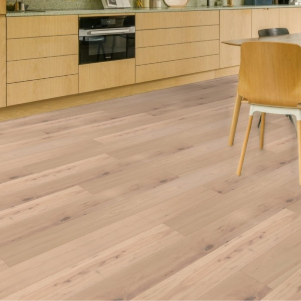 Close-up view of Burford Engineered Oak Flooring in White Brushed UV Oiled, highlighting the textured wood grain and precise bevelled edges