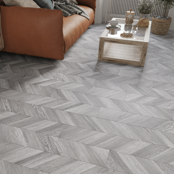 Close-up view of Madrid Chevron Laminate Grey Oak plank with realistic wood grain and bevelled edgesClose-up view of Madrid Chevron Laminate Grey Oak plank with realistic wood grain and bevelled edges