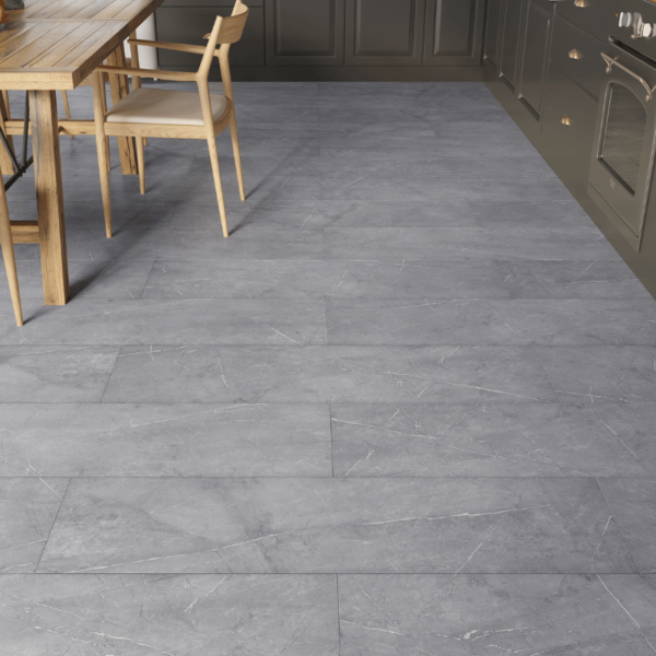 Close-up view of Valencia Tile Laminate Dark Grey Stone plank with realistic stone texture and bevelled edges