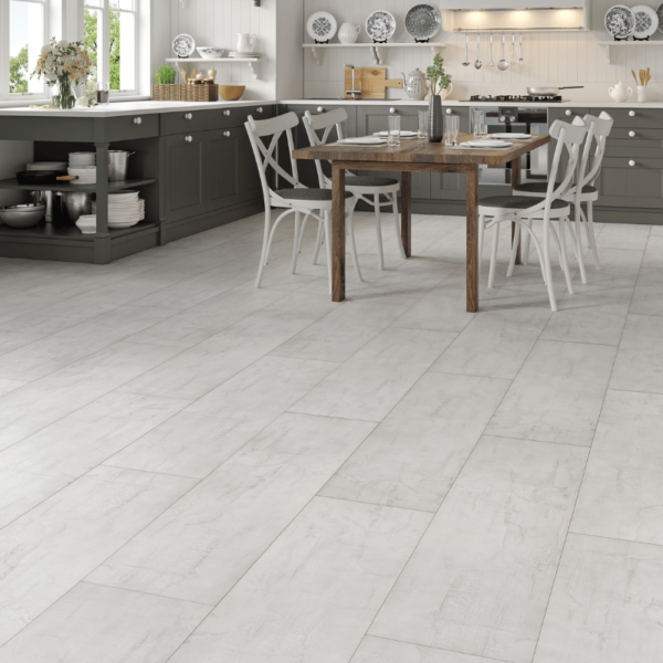 Wide room view of Valencia Tile Laminate Light Grey Stone flooring with tile design and bevelled edges